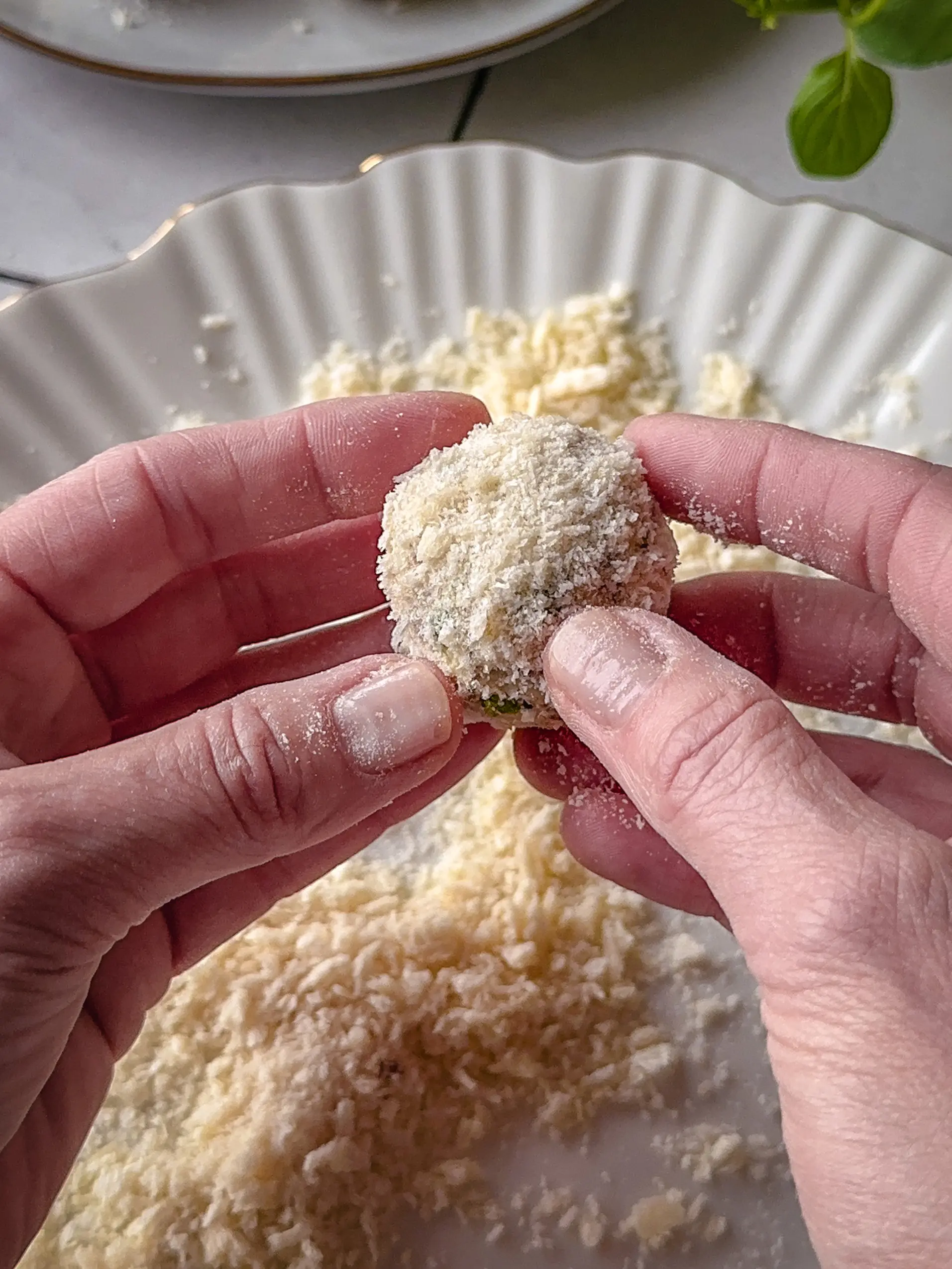 Zubereitung der veganen Blumenkohl Arancini Step by Step erklärt.